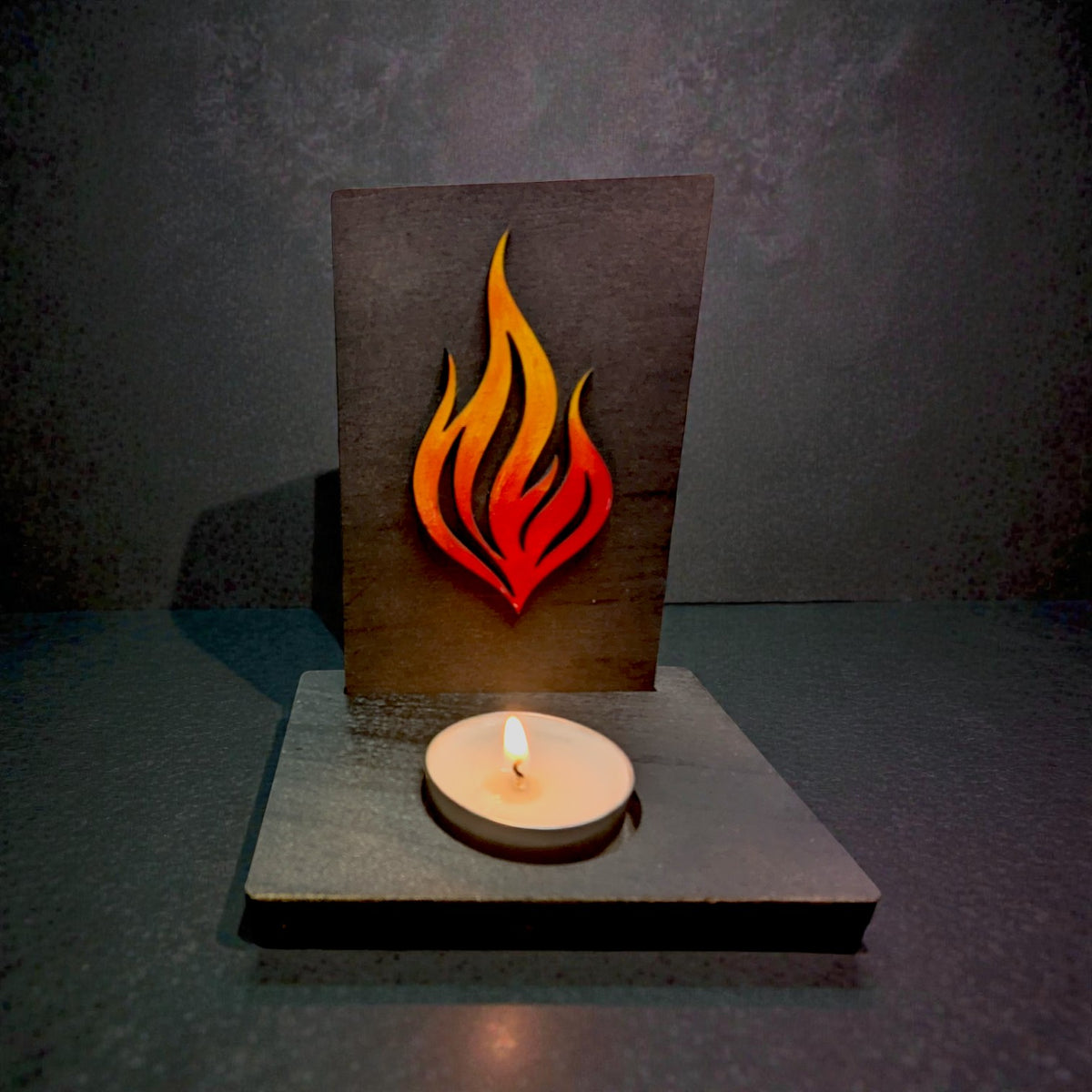 Finished DIY Imbolc candle holder with tealight for seasonal altar