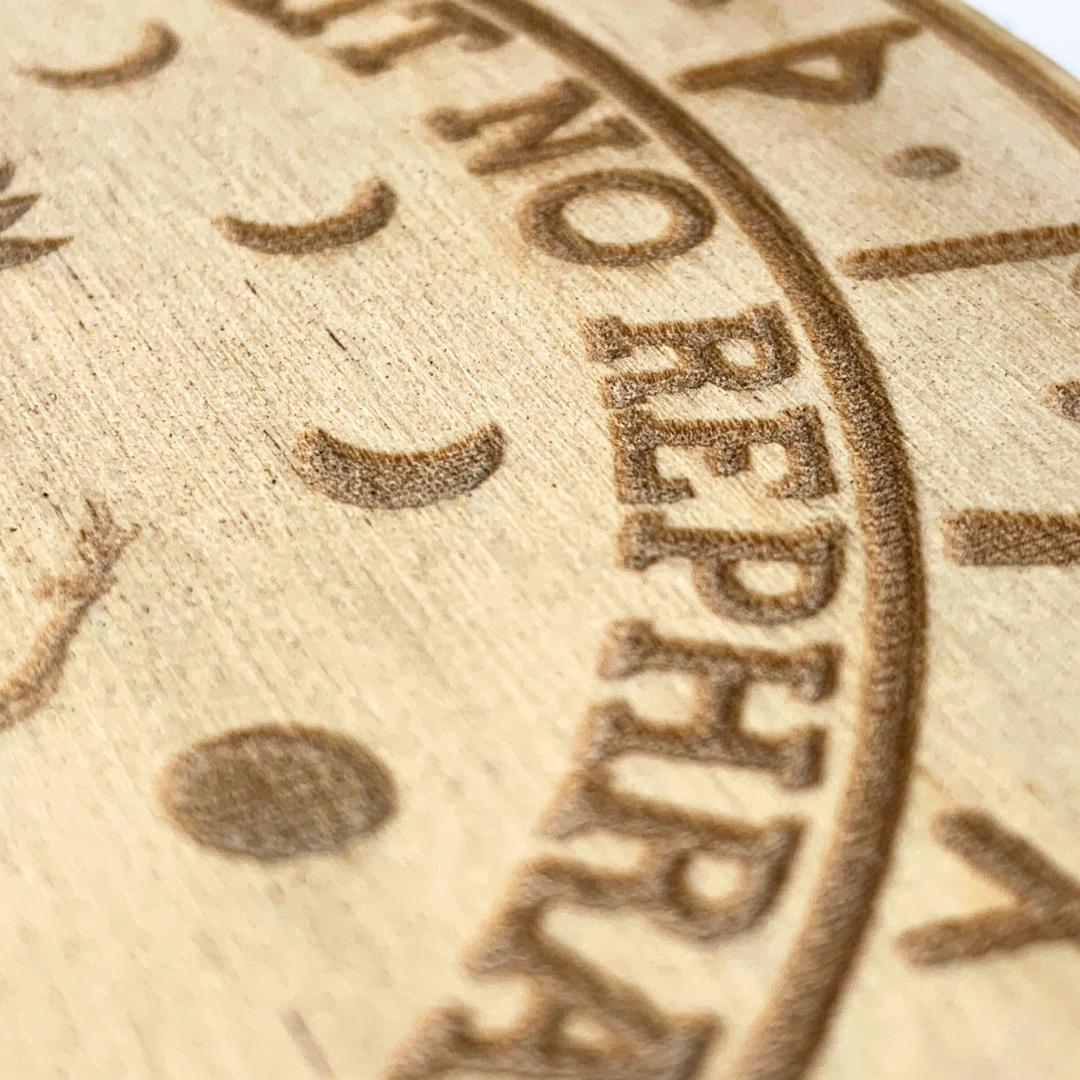 Engraved pendulum board with letters