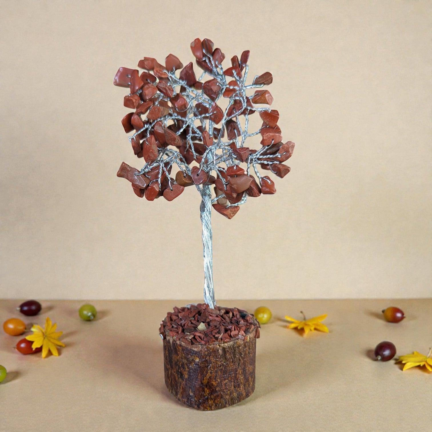 Decorative tree with brown leaves on a beige background